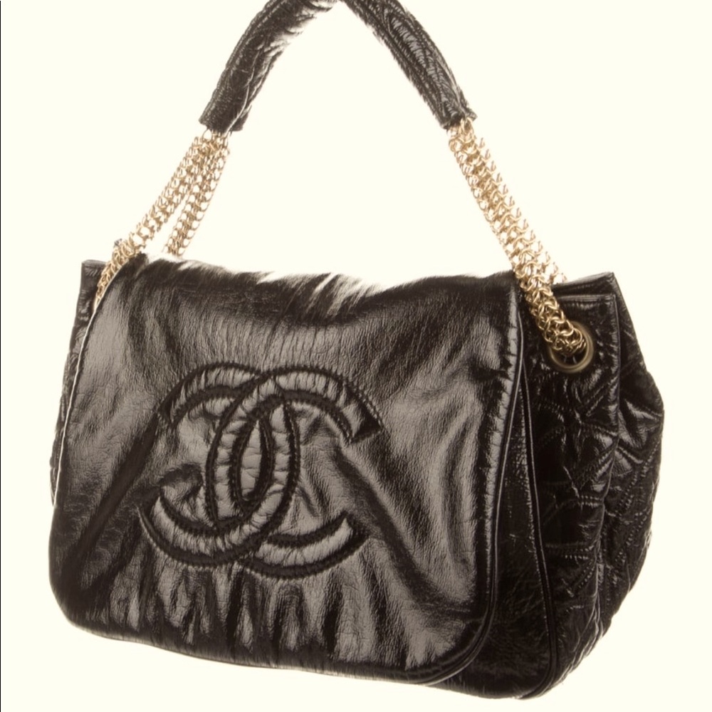 Authentic Chanel Rodeo Drive Accordion bag, black leather / gold hardware